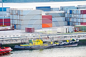 Moored boats and freight containers