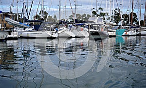 Moored boats and reflections seen on the waterways Victoria. photo