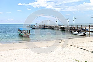 Moored boats at Tanjung Kelayang Beach on Belitung Island.