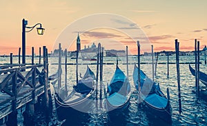 Gondolas in Venice Italy at dusk.