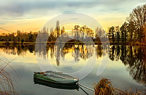 Moored rowing fisherman`s boat