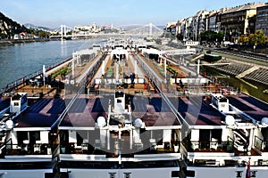 Moored Swiss hotel boats on the Danube at Budapest. city skyline. travel and tourism