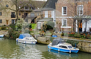 Moored-up, private boat seen by a private residence in England.