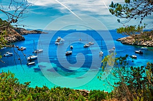Sailboats at Cala Salada lagoon. Ibiza, Spain photo