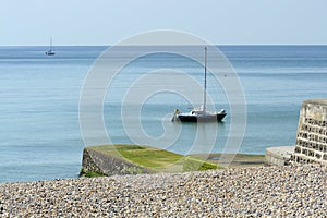 Moored yacht off Brighton Marina. England