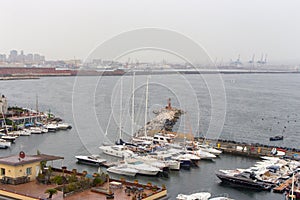 Moored yachtes and boats in port. Sailing and shiping concept. photo