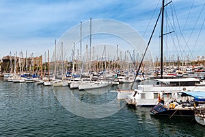 Moored yachts at sea port of Barcelona town, Catalonia, Spain