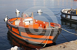 Mooring boat in a harbour