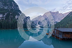 Mooring of boats on Lake Braies at first light in the morning