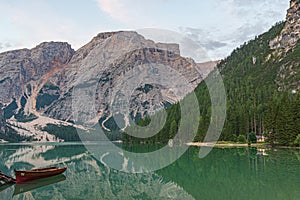 Mooring of boats on Lake Braies at first light in the morning