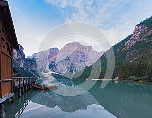 Mooring of boats on Lake Braies at first light in the morning