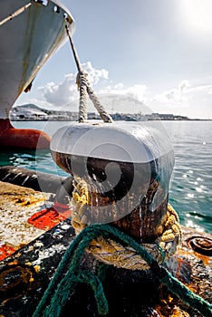 Mooring bollard with rope