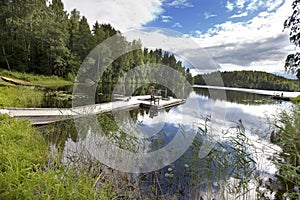 The mooring on the forest lake. Finland