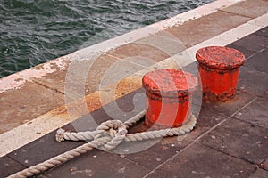 Mooring line on bollard photo