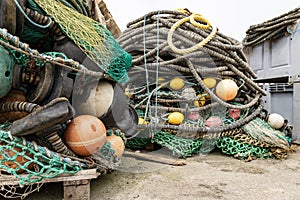 Mooring ropes and nets on a fishing boat. Accessories needed for fishing