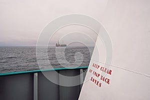 Mooring safety onboard ship or vessel. snapback zones danger sign