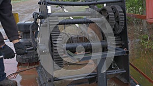 Mooring winch on in the stern of the vessel. Winch on a deck of ship in the sea. mooring winch, mooring windlass rope