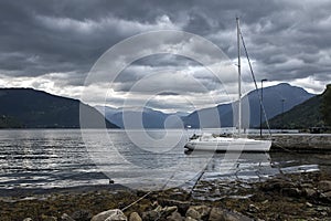 Mooring yacht in Norwegian fjord