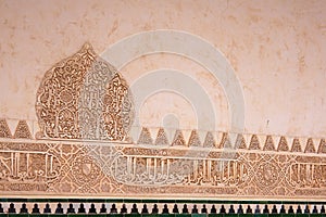 Moorish stone carvings in Alhambra Palace, Granada, Spain