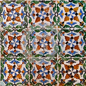 Moorish style ceramic colourful tiles with geometrical patterns from Seville photo