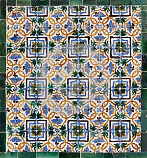 Moorish style ceramic tiles in colourful geometrical patterns from Seville photo