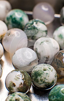 Moos agate gems balls in details photo