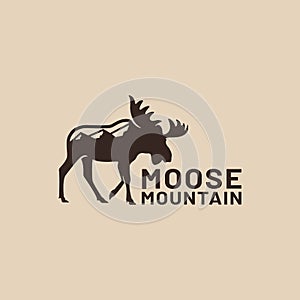 Moose Deer Silhouette with Mountain Logo Design Template
