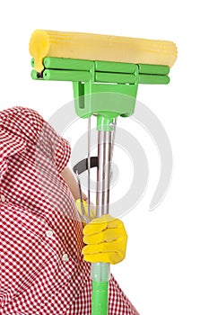 Mop in charwoman hand on white photo