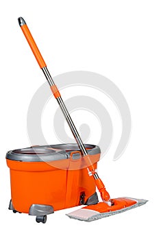 A mop and an orange bucket on a white isolated background