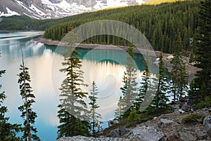Moraine lake and forests photo
