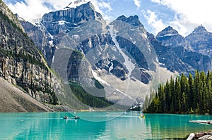 Moraine Lake, kayaking on turquoise Moraine Lake with Rocky Mountains, Canada