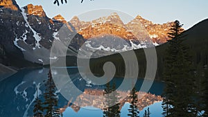 Moraine lake at sunrise in banff national park, canada