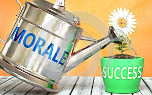 Morale helps achieving success - pictured as word Morale on a watering can to symbolize that Morale makes success grow and it is photo