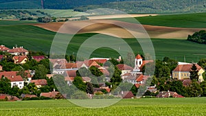 Moravian old village with meadow fields in the summer time