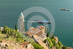 Morcote, Switzerland - October 6th 2021: View over the historic church to Lago di Lugano photo