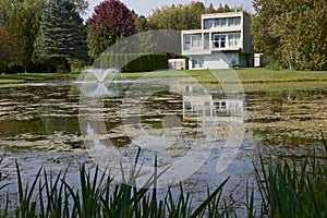 Morden design residential building with a pond in Ontario, Canada