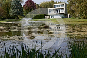Morden design residential building with a pond in Ontario, Canada photo