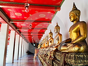 More Buddha image golden meditation at Wat Pho, Bangkok Thailand