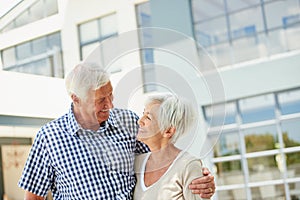 More in love than ever. a happy senior couple standing together outside.