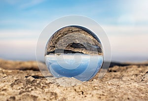 Morecambe Bay, Morecambe, Lancashire, as seen through a crystal photography ball