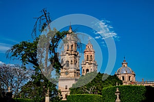 Morelia Cathedral in Michoacan, Mexico against a blue sky