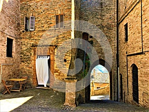 Moresco town in Fermo province, Marche region, Italy. Medieval home and arch, peace and silence