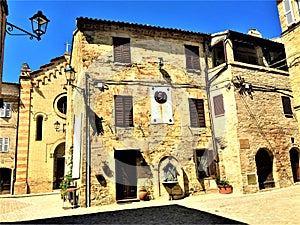 Moresco town in Fermo province, Marche region, Italy. Middle Ages, medieval atmosphere, fountain, home, shadows and lamp
