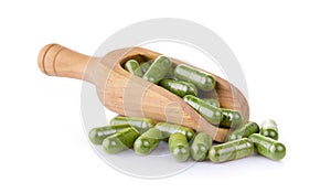 Moringa capsules in the scoop