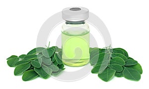 Moringa leaves with medicine in vial