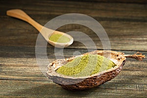 Moringa oleifera - Moringa green powder. Text space