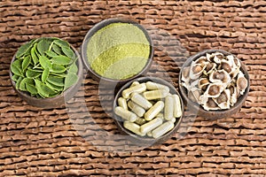 Moringa seeds, leaves and powder and capsules - Moringa oleifera