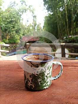 Mornin coffee with natural bamboo forest photo