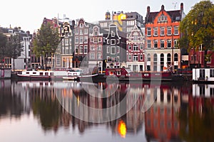 Morning Amsterdam canal with dutch houses