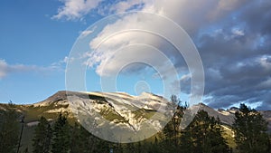 Morning in the Banff mountain. Sunrise and cloudy sky